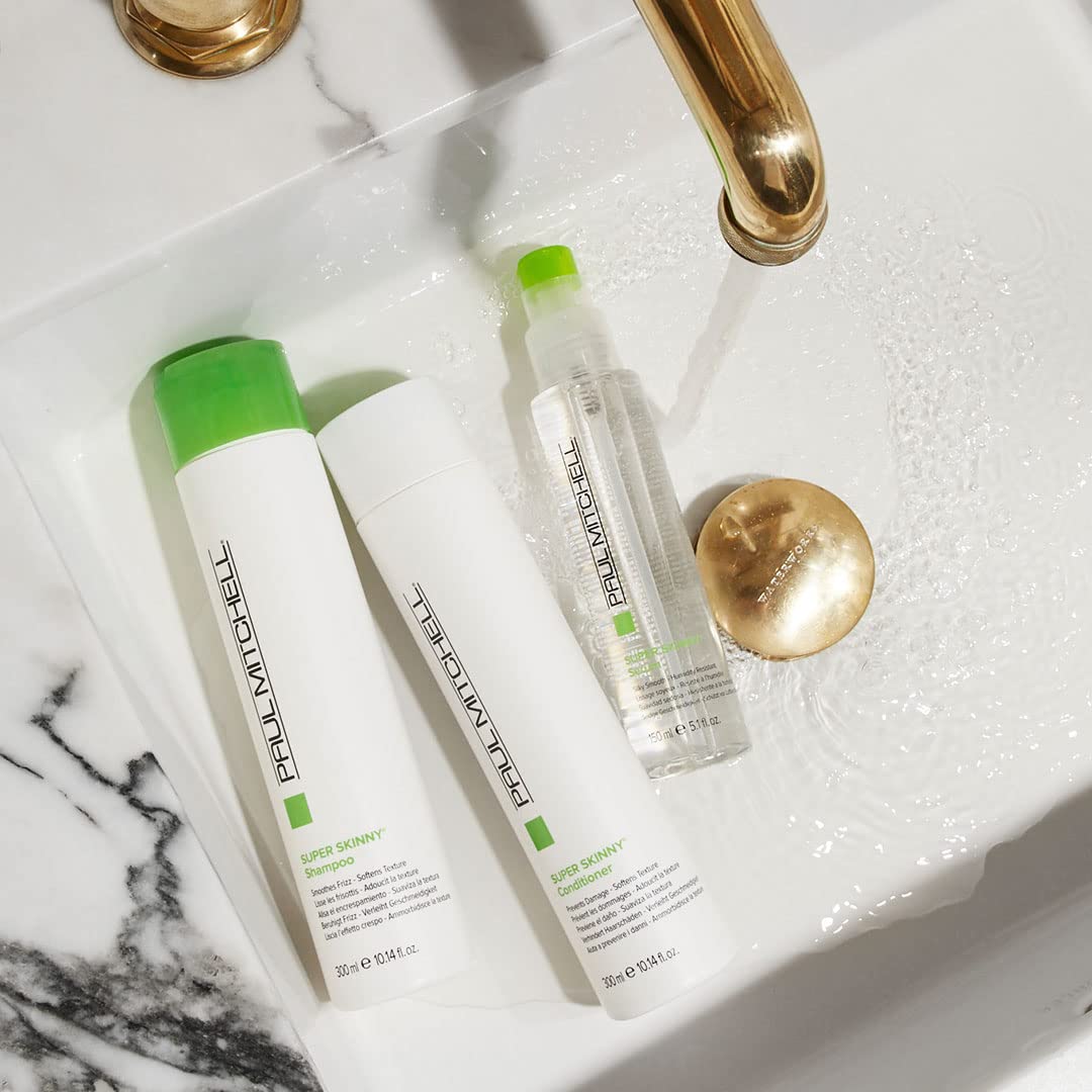 Paul Mitchell Super Skinny Serum bottle highlights fragrance notes of bergamot and apple.