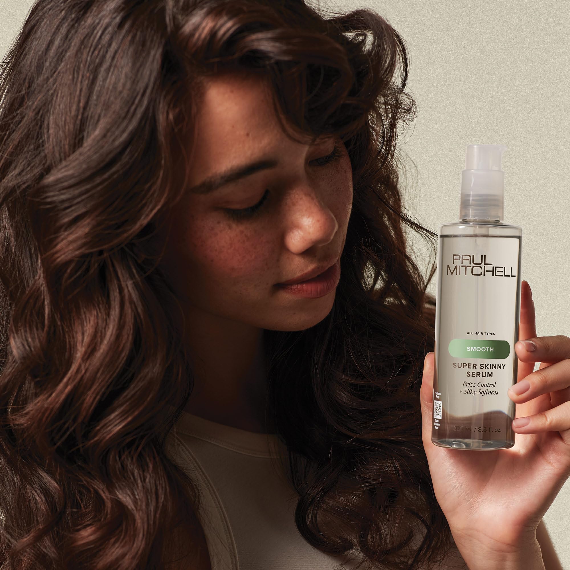 Paul Mitchell Super Skinny Serum bottle releases fruity fragrance during styling for a refreshing experience