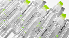 Paul Mitchell serum applied on damp hair for silky shine
