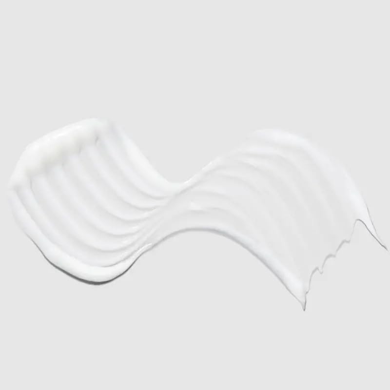 Paul Mitchell Super Strong Conditioner jar close-up suggests damaged-hair rebuilding benefits.