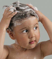 Paul Mitchell Taming Spray demonstrates detangling without pulling.