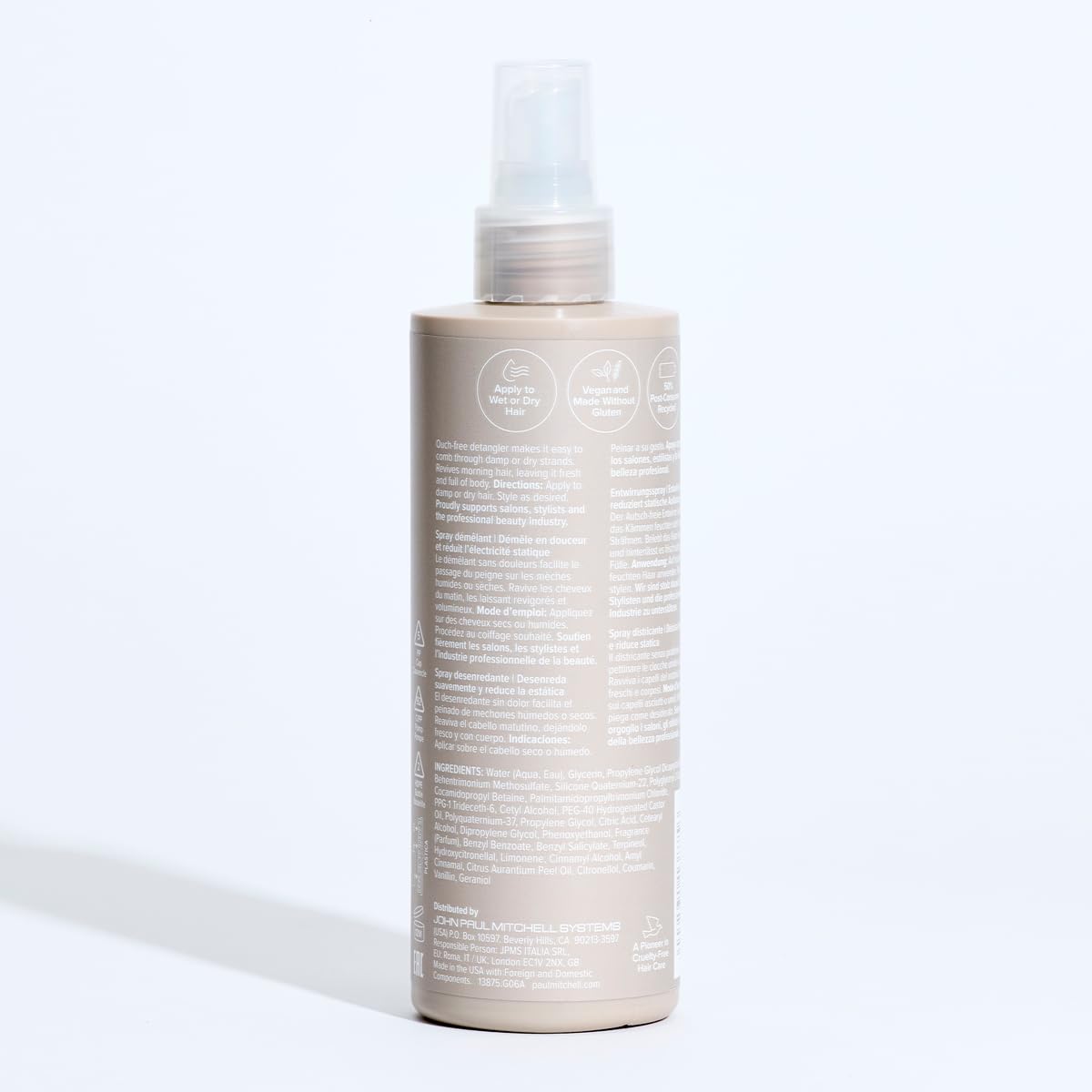 Paul Mitchell Taming Spray packaging uses PCR materials for eco-conscious packaging.