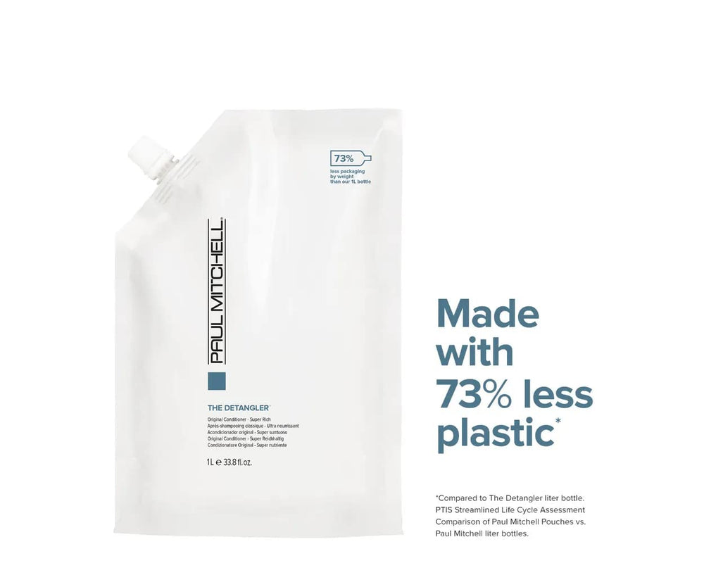Paul Mitchell The Detangler conditioner apply image highlights rich moisture and shine on color-treated hair.