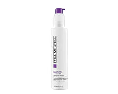 Paul Mitchell Thicken Up bottle application demonstrates fuller, defined strands.