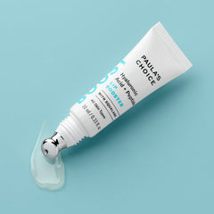 Paula's Choice BOOST Lip Booster applied on lips delivers a dewy finish for fuller-looking lips.