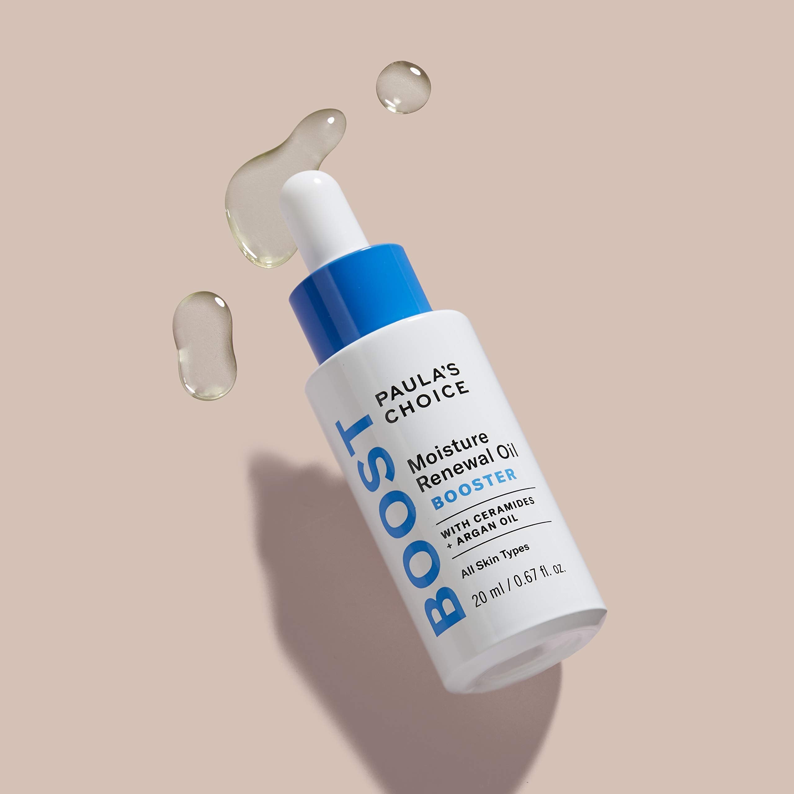Paula's Choice Boost Moisture Renewal Oil Booster on-skin-use demonstrates easy layering with moisturizer.