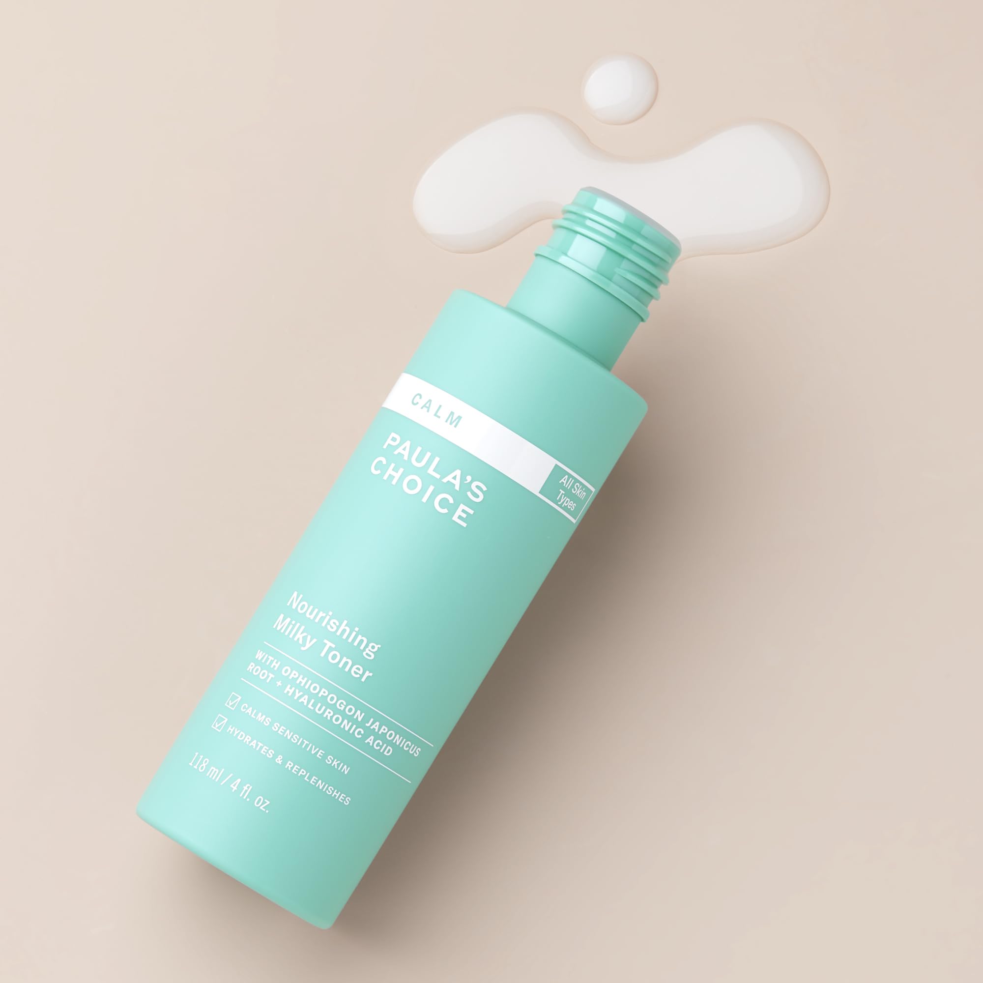 Paula's Choice Calm Milky Toner swirl reveals creamy texture delivering lightweight hydration and redness relief.