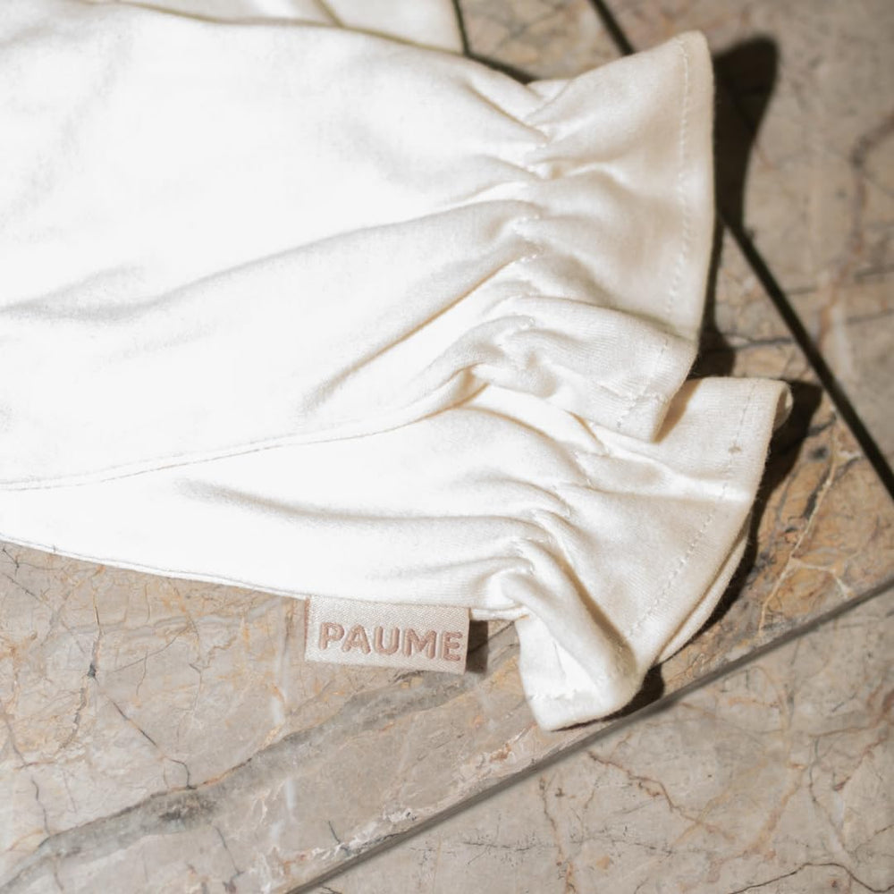 PAUME Reusable gloves are machine-washable for ongoing hydration routines.