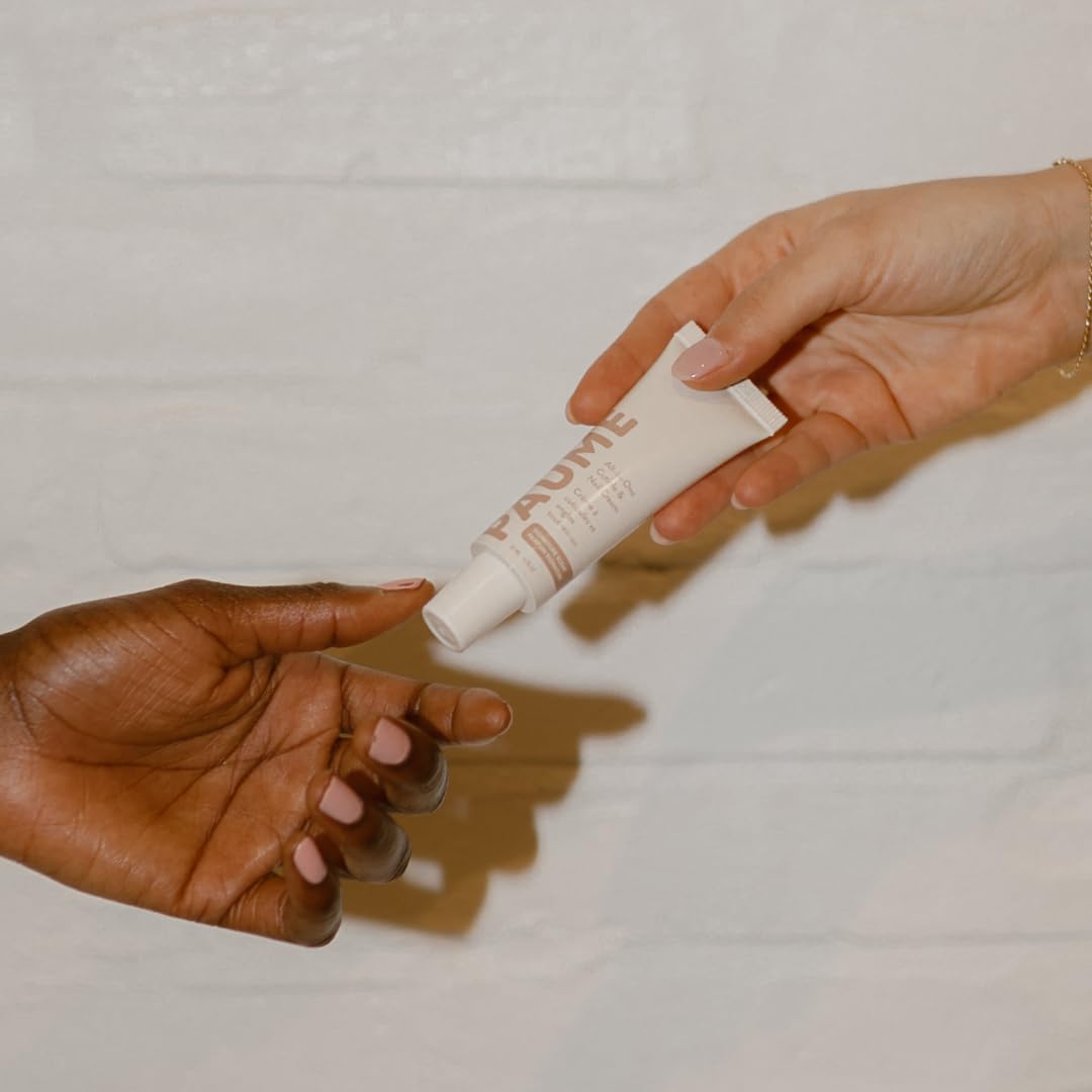 PAUME packaging-open shot reveals travel-friendly 0.75oz tube for on-the-go care.