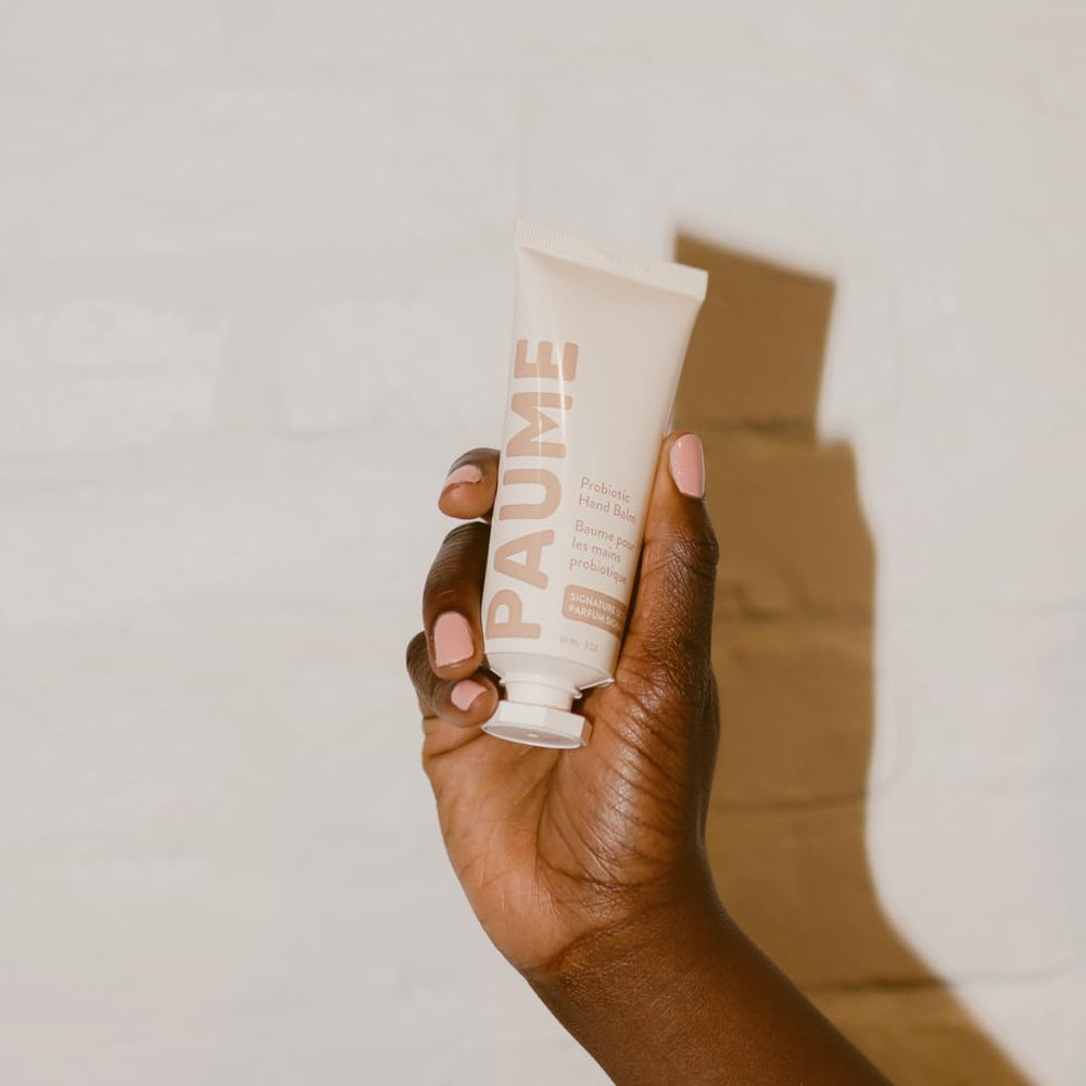 Ingredients highlight plant-based emollients and probiotics in PAUME balm.