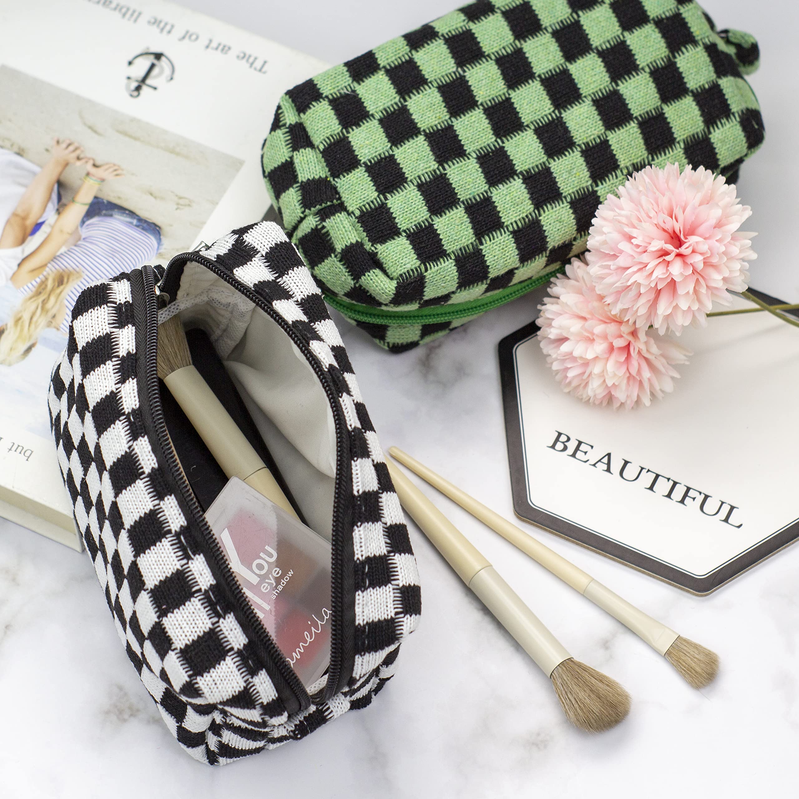 PAZIMIIK checkered makeup bag top zipper secures cosmetics while traveling.