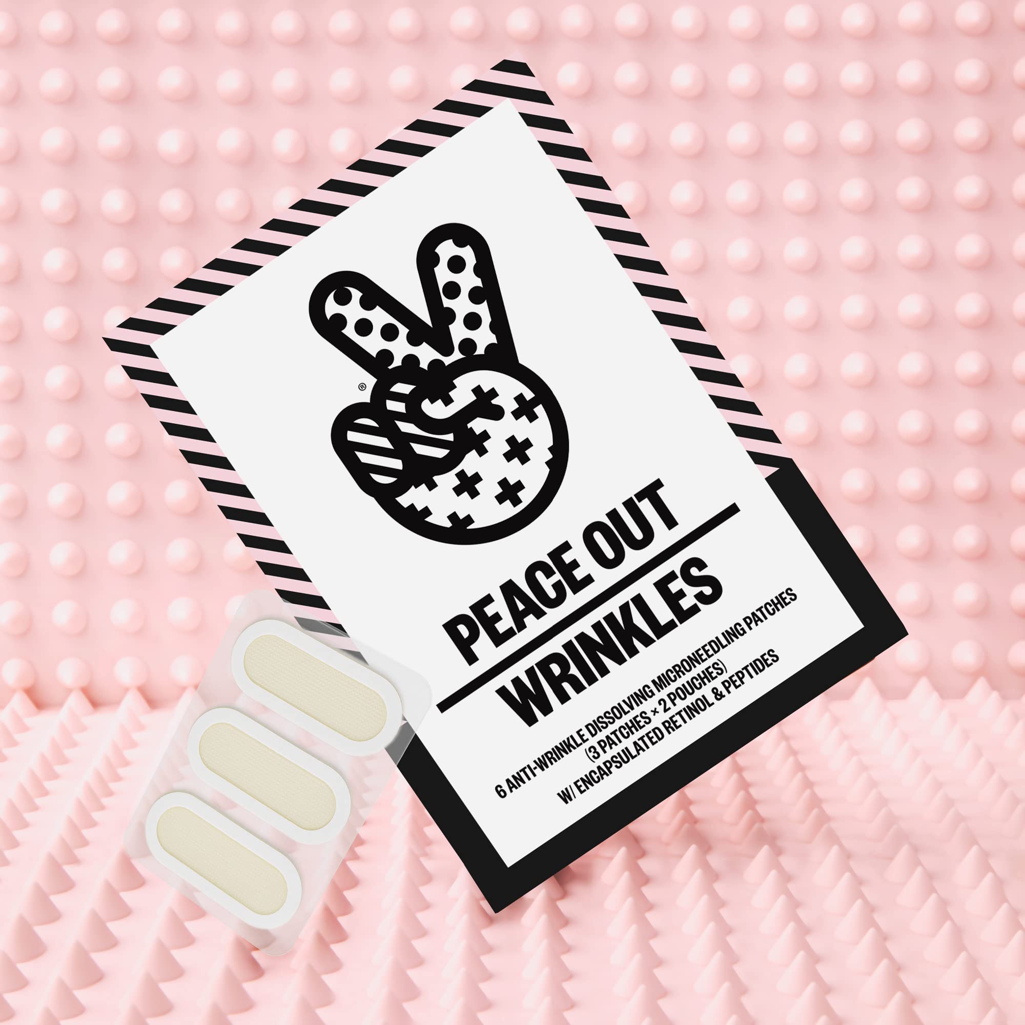 Peace Out microneedling patches close-up showing hyaluronic needles for active ingredient delivery.