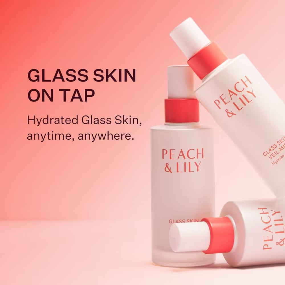 Peach & Lily Glass Skin Veil Mist packaging box displayed on a vanity.