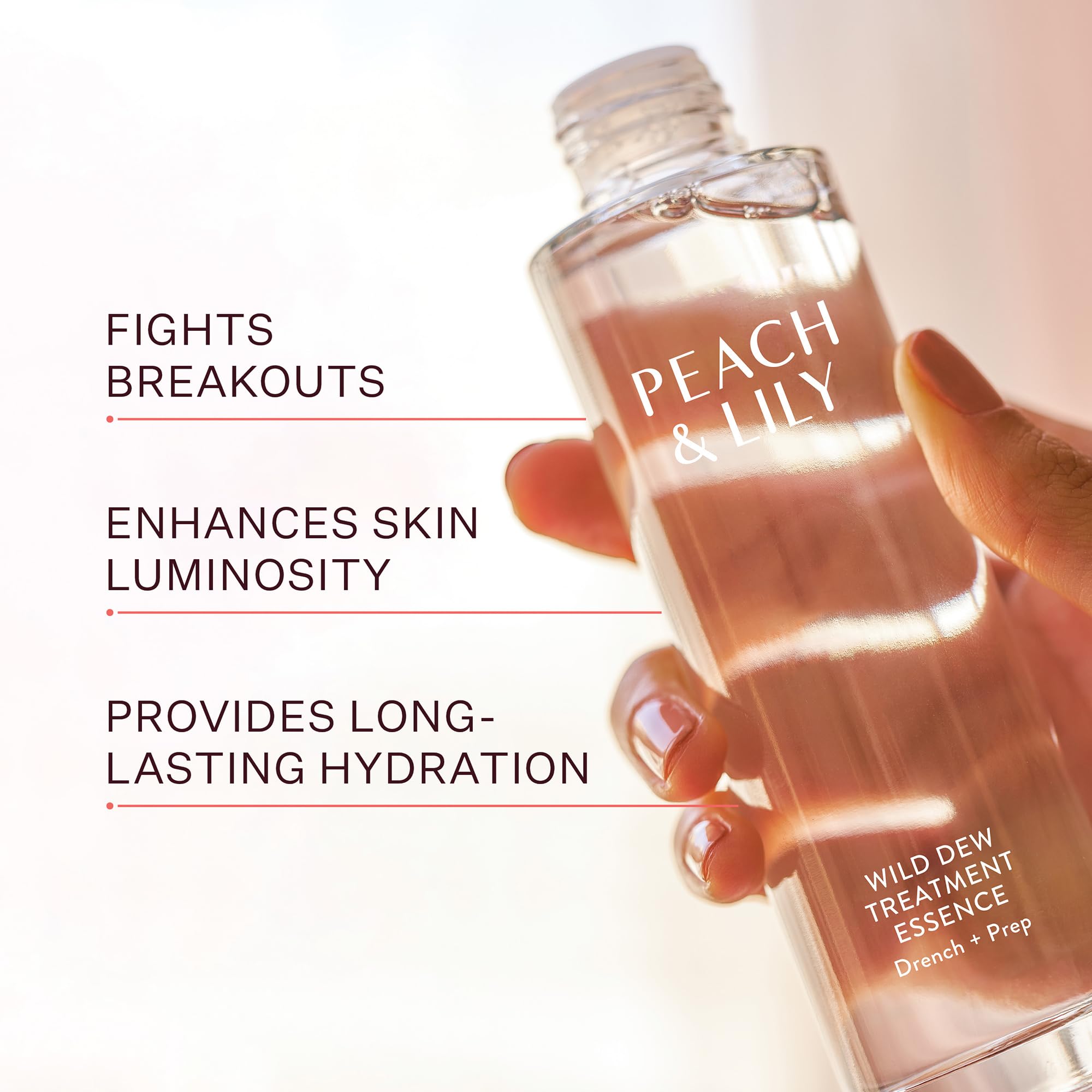 Peach & Lily Wild Dew essence droplet on skin demonstrating quick absorption.