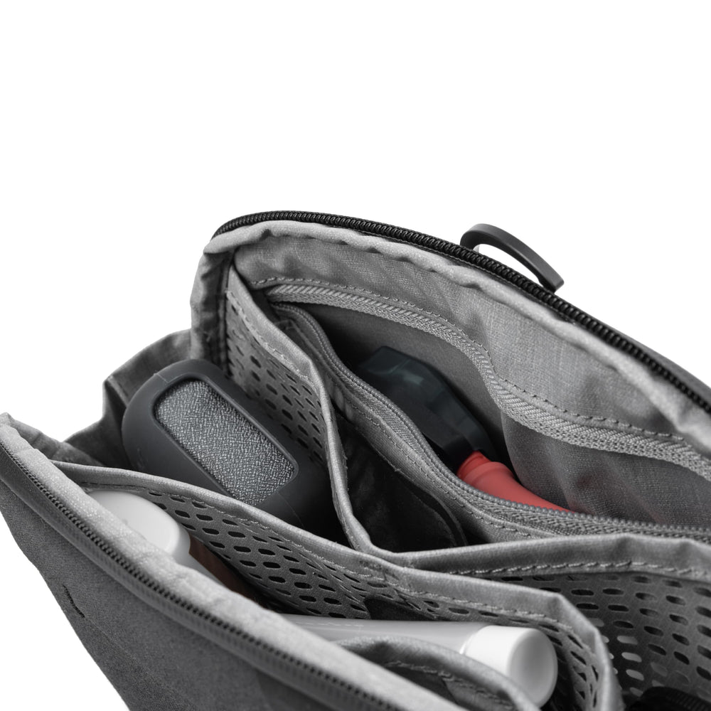 Peak Design Small Wash Pouch origami-style pockets for organized storage.
