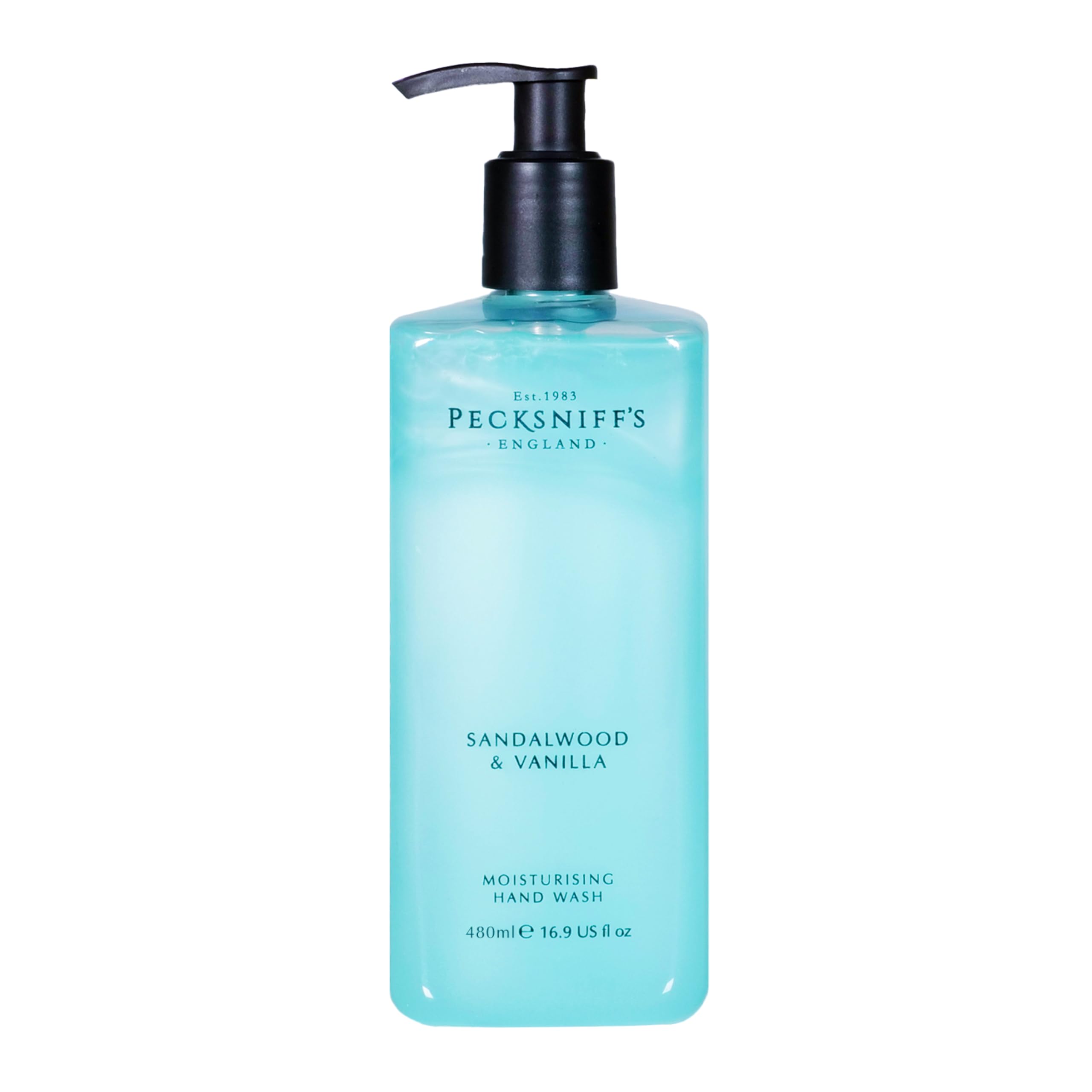 Pecksniff's Hand Wash sandalwood vanilla bottle on sink shelf offers luxurious fragrance for daily pampering.
