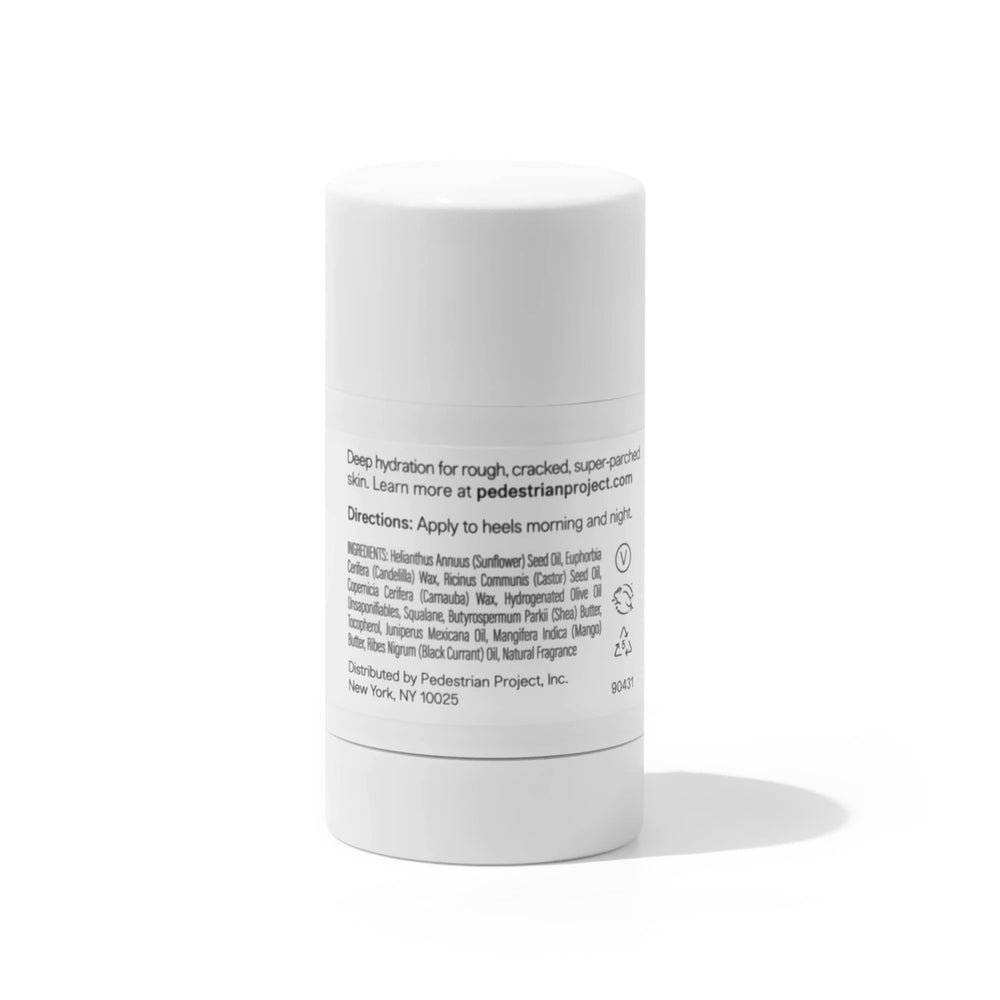 Pedestrian Project cracked heel repair balm being dispensed to smooth rough skin