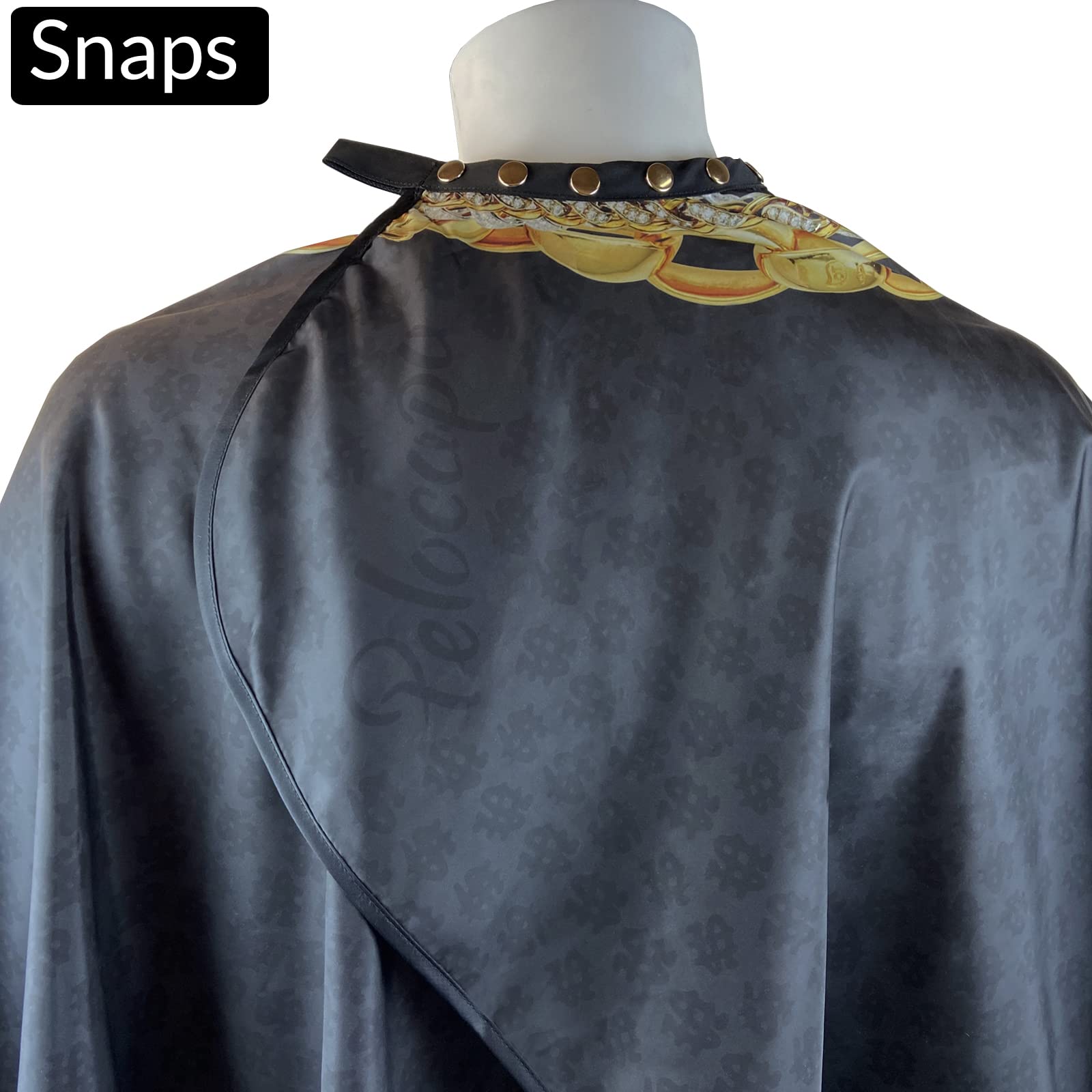 Pelocapa barber cape with adjustable snap closures for comfortable fit on all neck sizes.