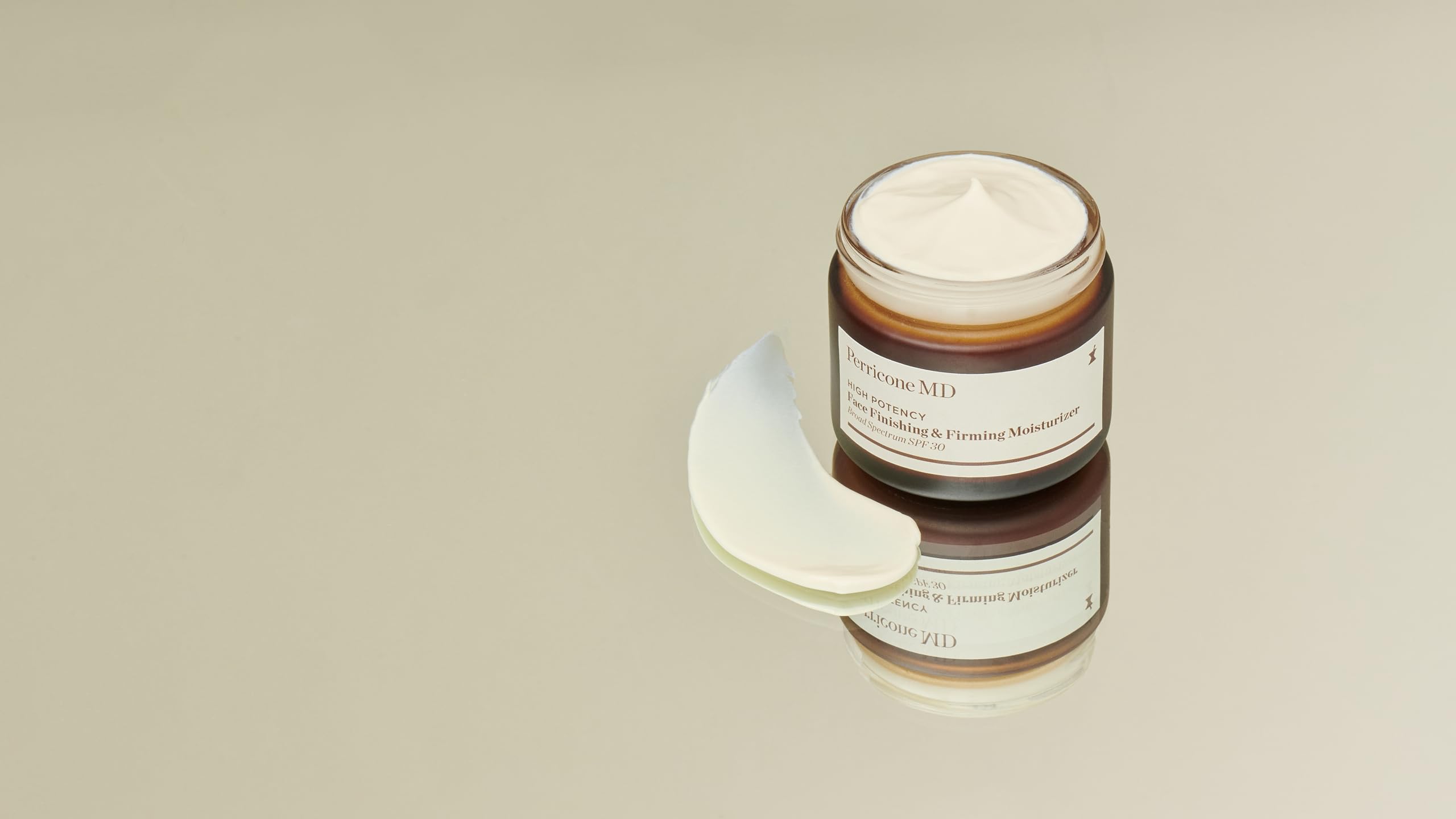 Perricone MD moisturizer texture close-up showing silky finish.