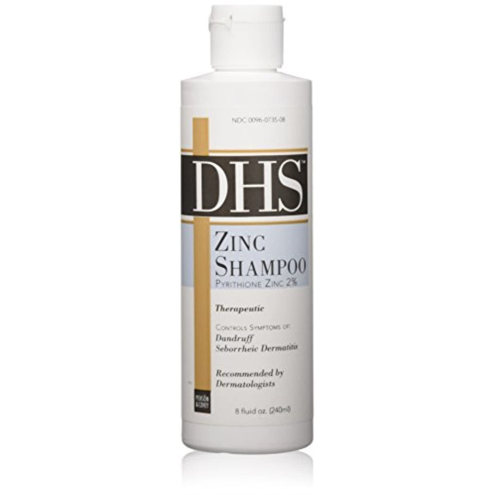 Person and Covey DHS Zinc Shampoo bottle highlights soothing scalp relief and nourishment.