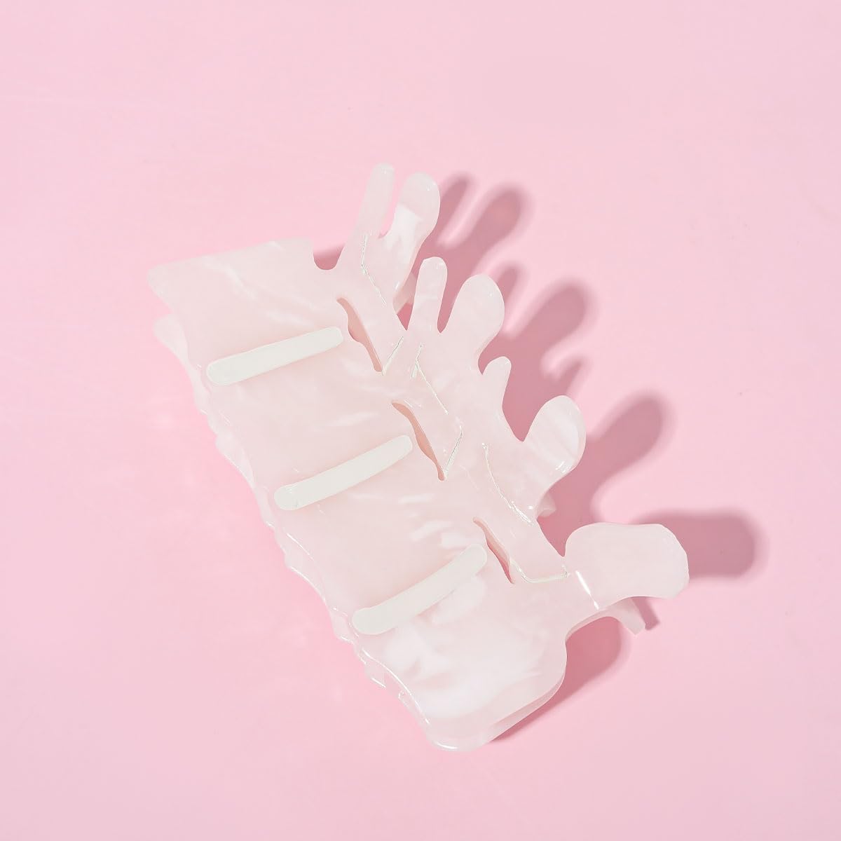 Personfun vertebrae design clip stands out in photos for conversation starting accessories