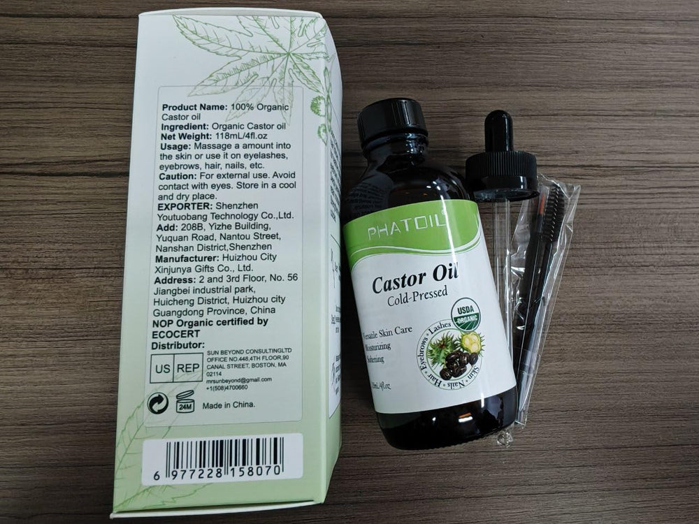 PHATOIL bottle in hand for size comparison conveying 118ml scale and portability benefit