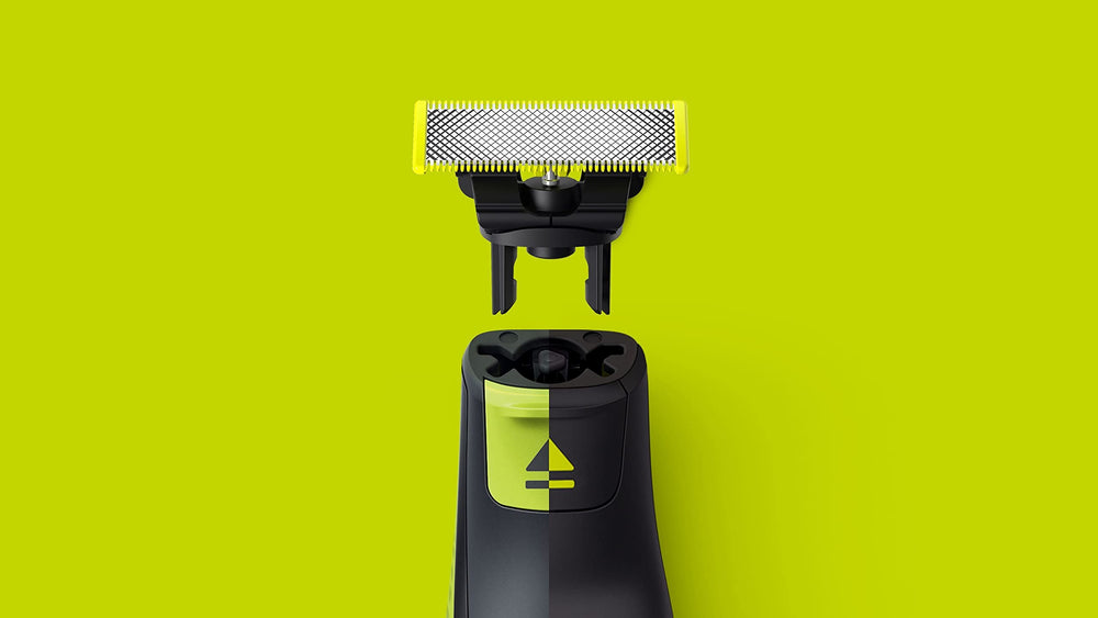 Philips OneBlade beard-trimmer-use close-up—versatile blades for facial hair.