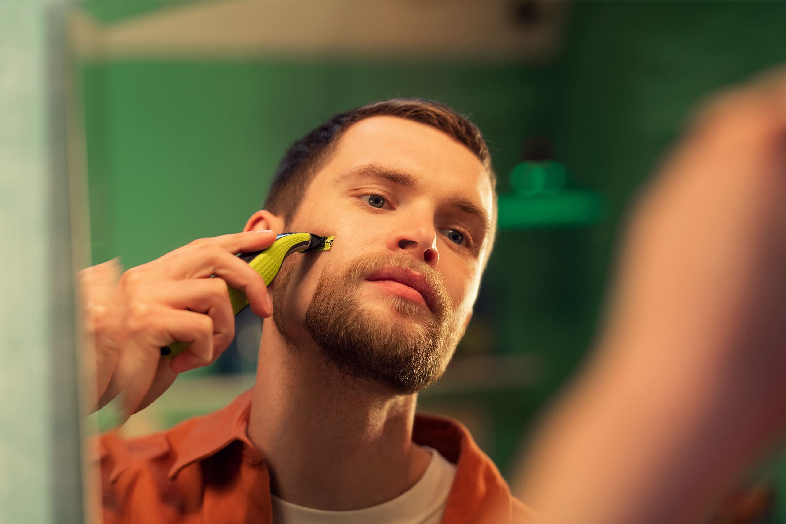 Philips OneBlade stainless-steel blades close-up—sharp edge for comfortable shaves.