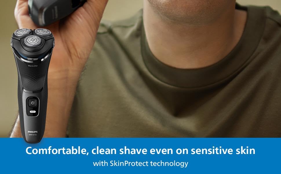 Philips Shaver 3000 one-touch open illustrates quick cleaning access under running water