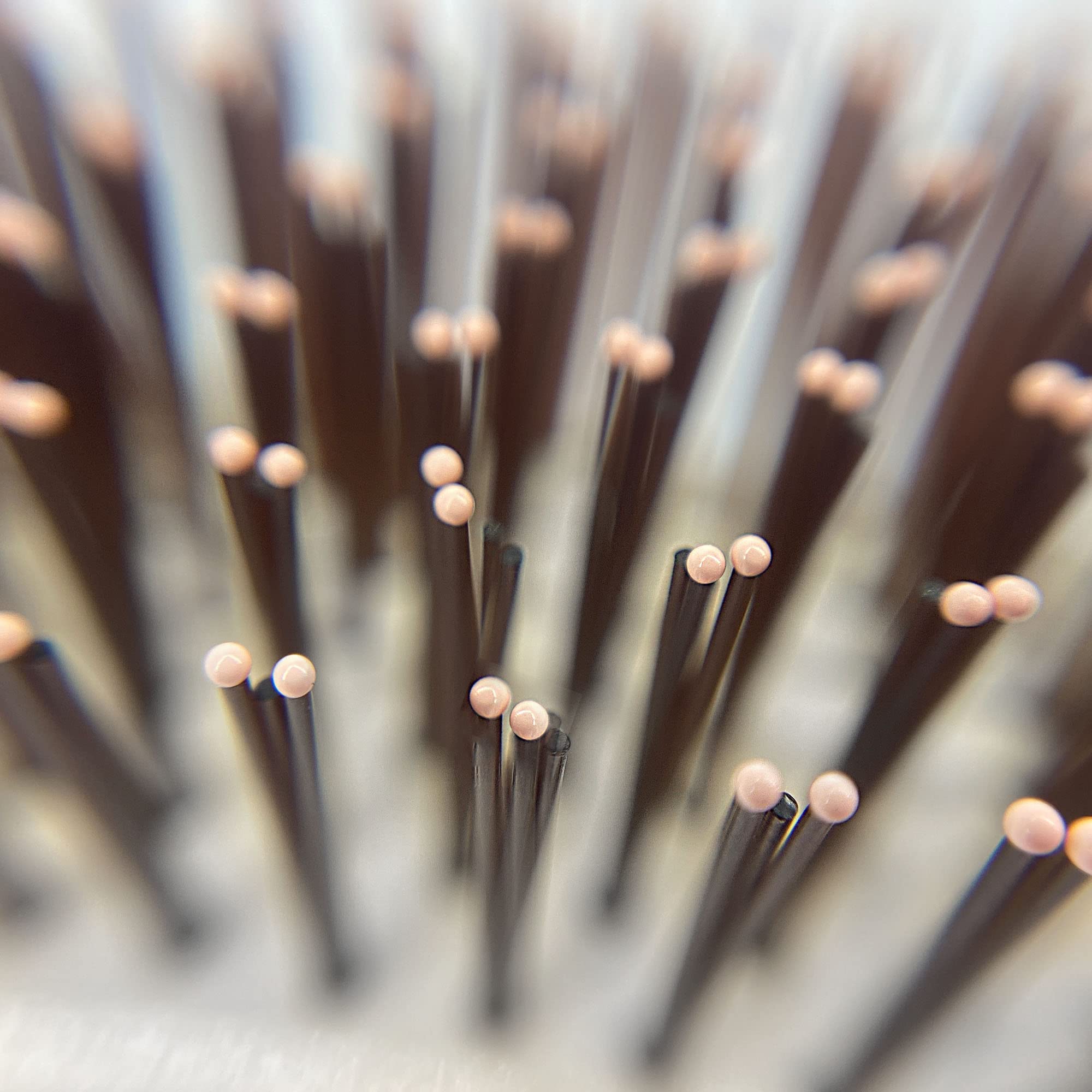 Phillips Brush Light Touch 6 hair detangling demonstrates knot-free glide for all hair lengths.