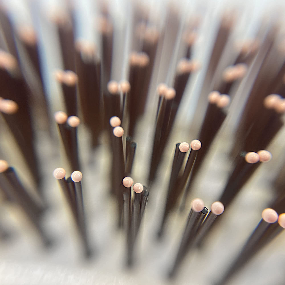Phillips Brush Light Touch 6 hair detangling demonstrates knot-free glide for all hair lengths.