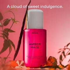 PHLUR Amber Haze spray delivers a fine mist for skin.