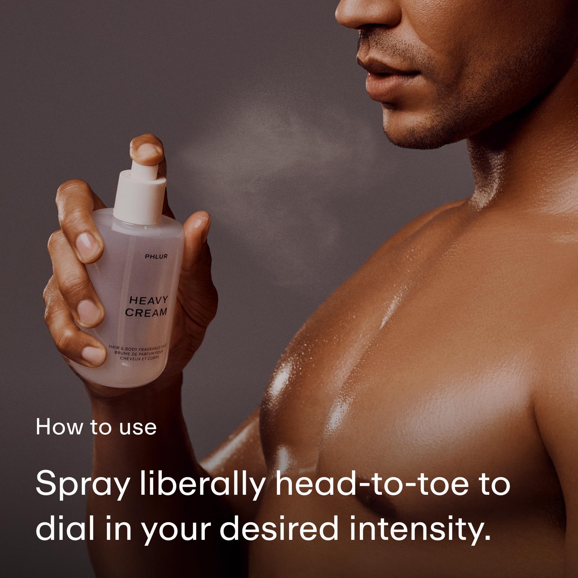 PHLUR Heavy Cream spritz on arm showing layerable hair and body mist