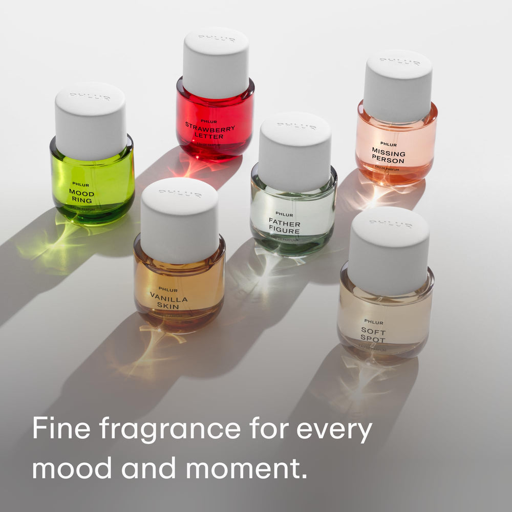 PHLUR Mood Ring base-notes image shows patchouli and amber for lasting depth