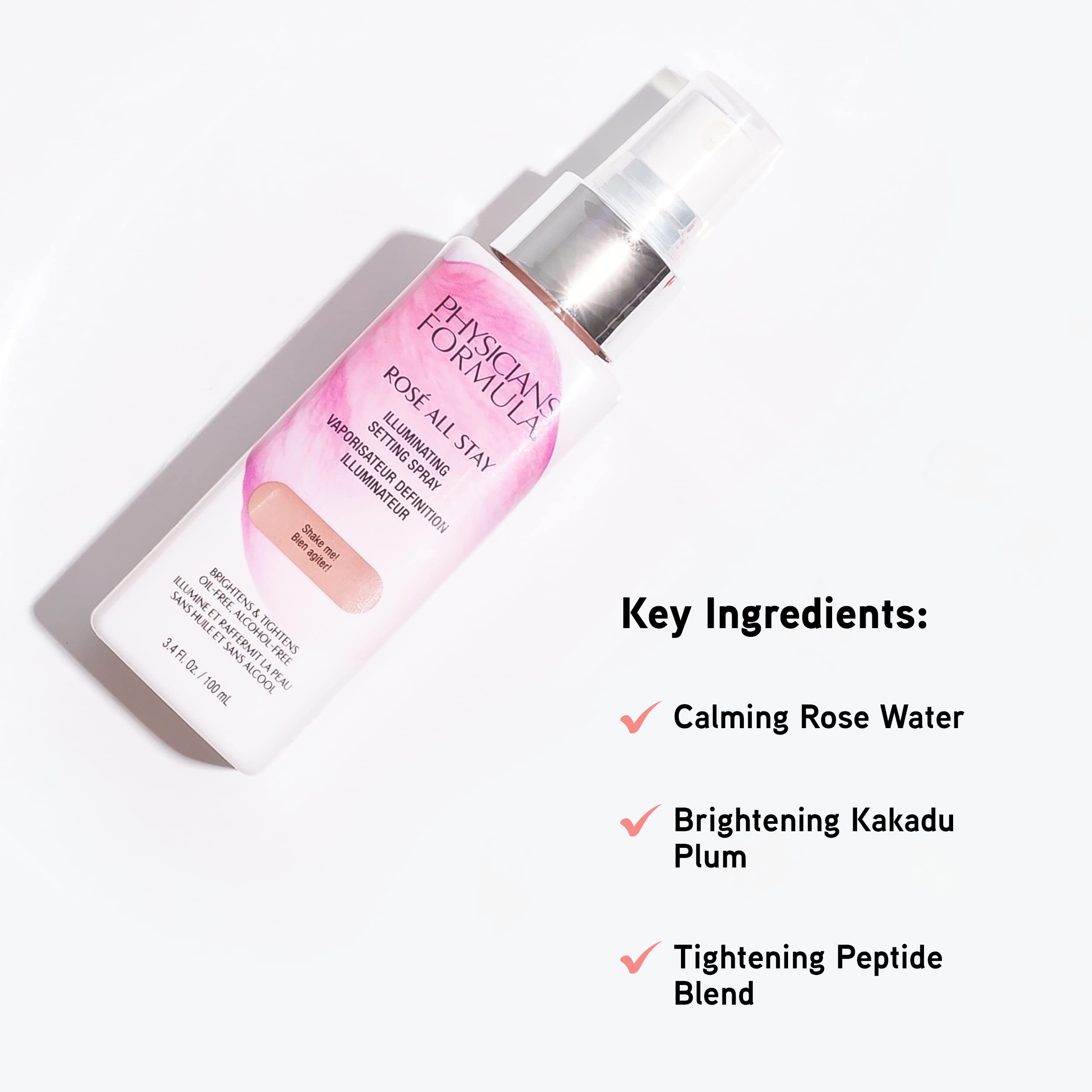Physicians Formula pearlescent finish setting spray applied for subtle glow.