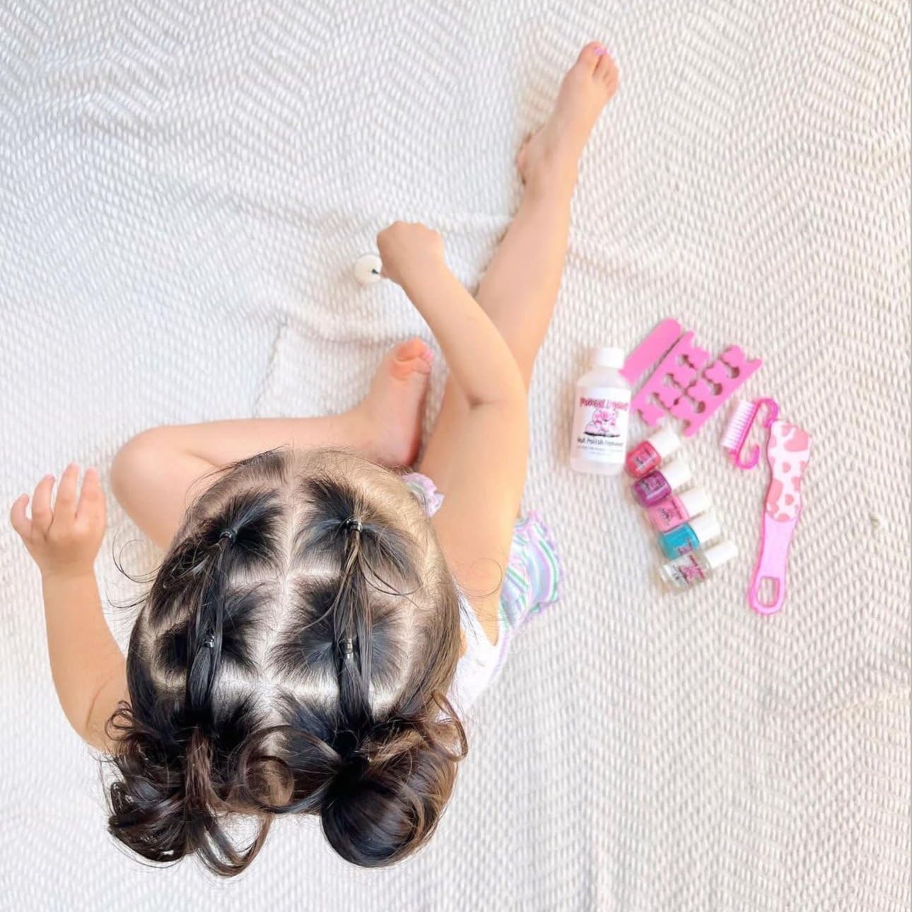 3-D nail art stickers included with Piggy Paint set for creativity.