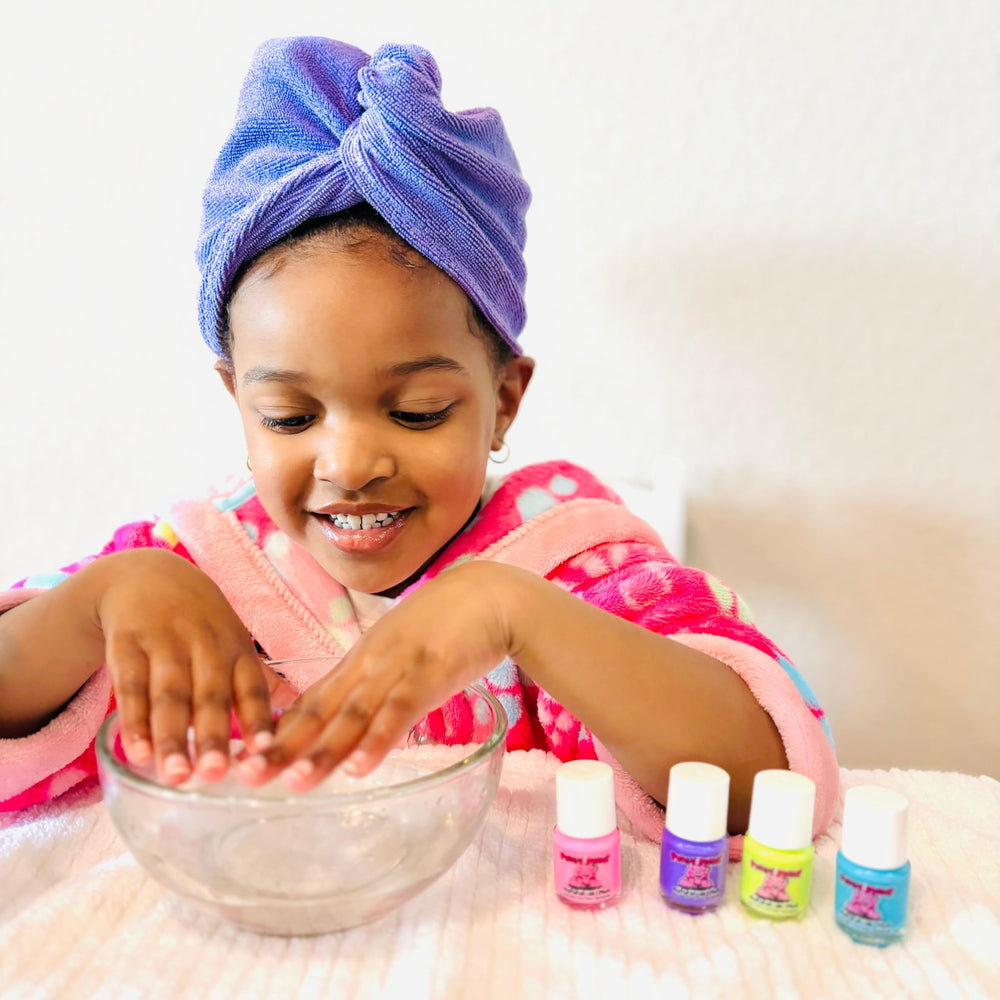 Piggy Paint warm-air dry tip speeds manicure for kids.