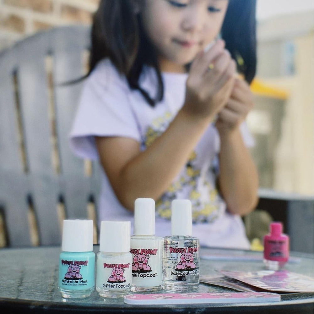Piggy Paint Mini Nail File included for gentle shaping.