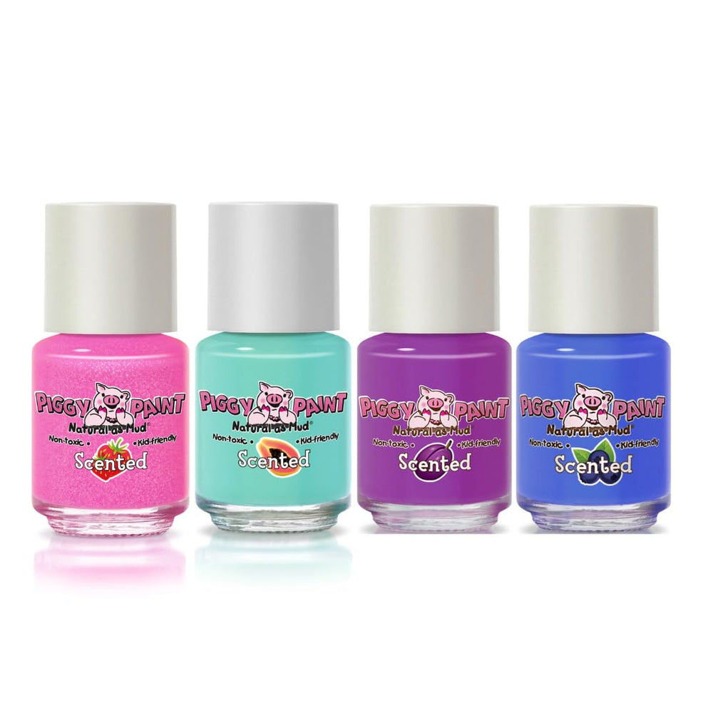 Closeup of Piggy Paint bottles with fruity scents offering kid-friendly fragrance.