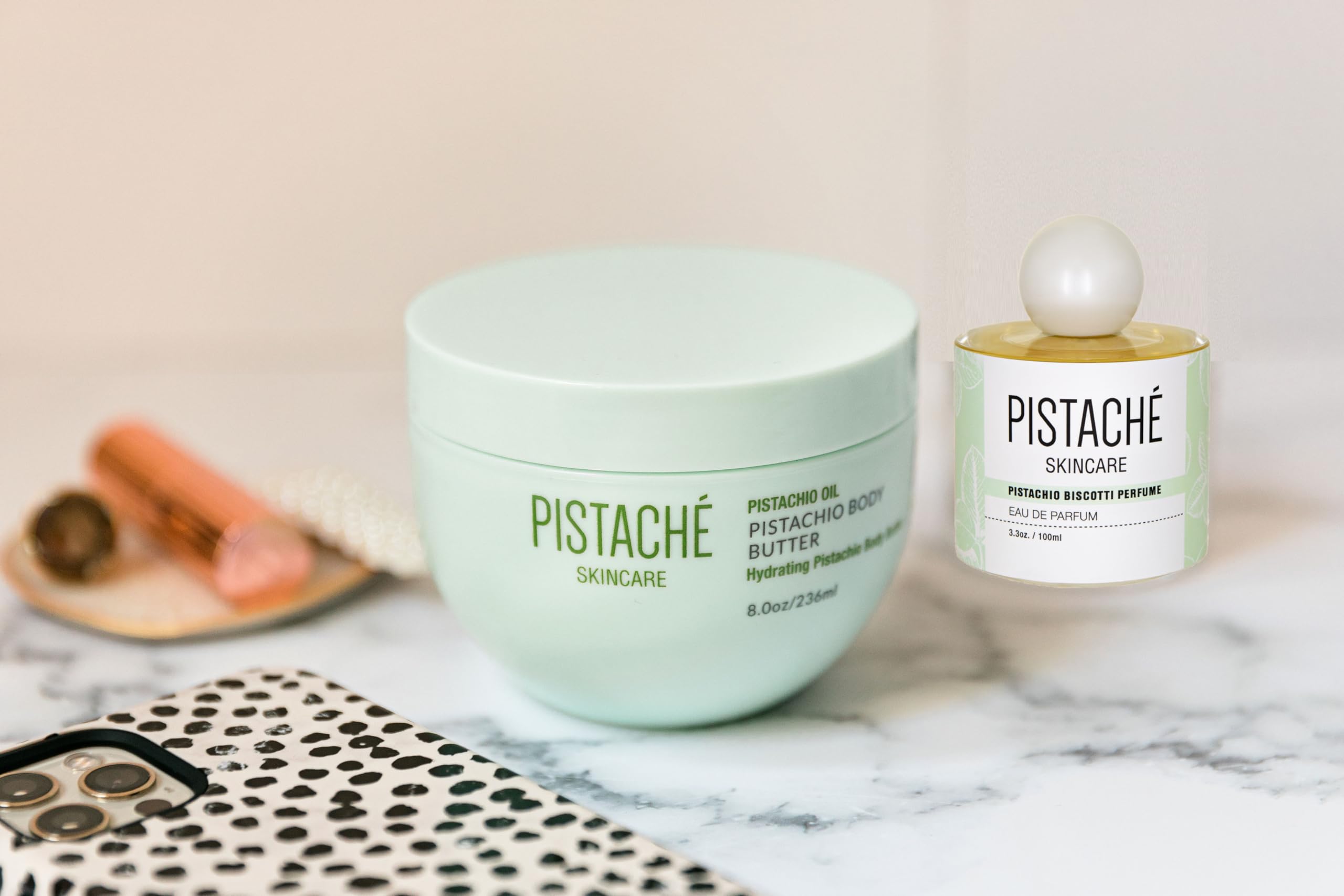 Pistaché Skincare model applying fragrance illustrates effortless daily wear.