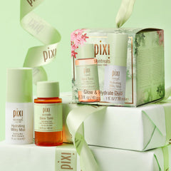 Pixi Glow Tonic cotton pad applying exfoliation for brighter skin.