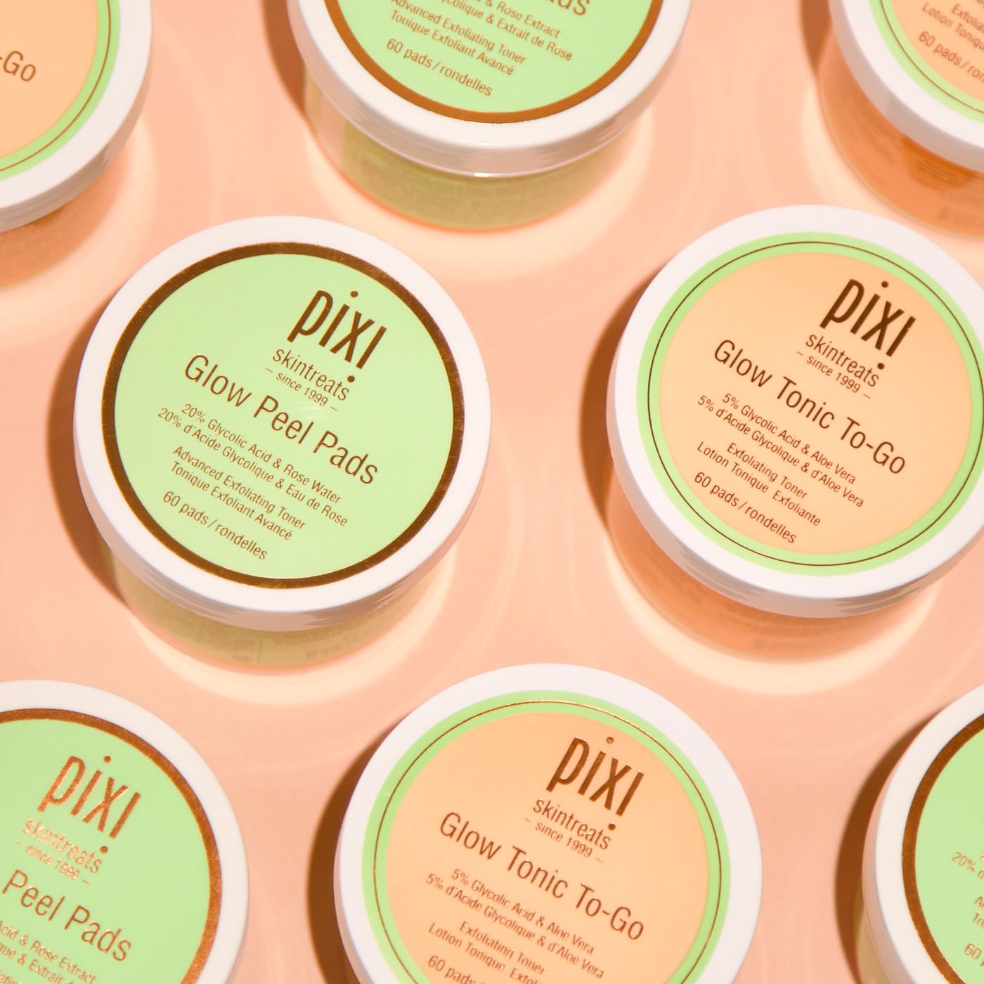 Pixi Glow Tonic to-Go cotton pad swiping across skin for gentle exfoliation.