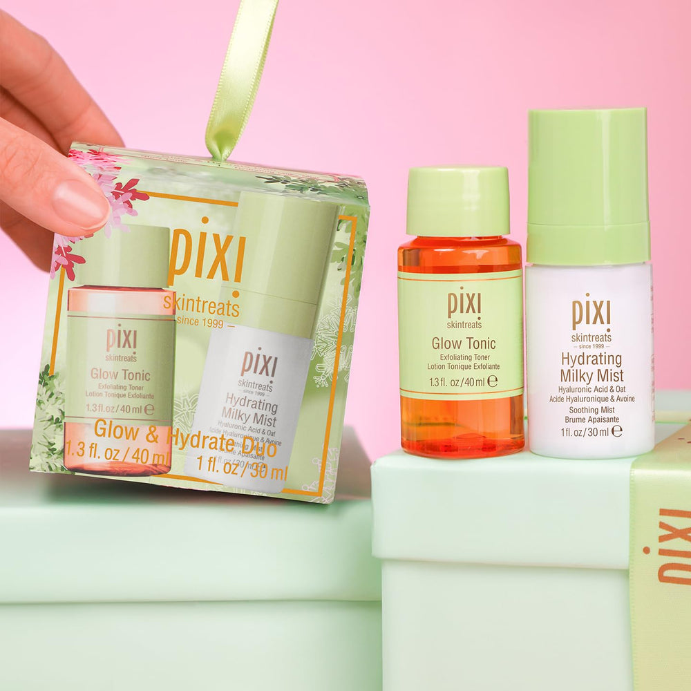 Pixi Hydrating Milky Mist bottle delivering cooling hydration over makeup.
