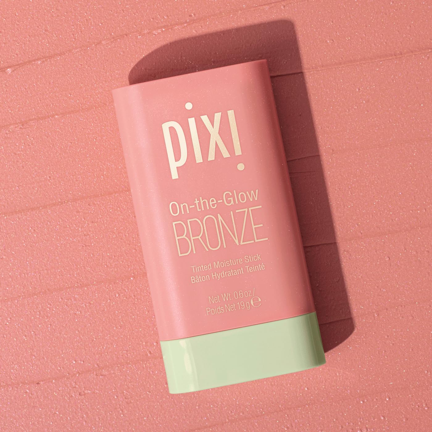 Pixi On-the-Glow Bronze WarmGlow stick swirl demonstrates easy blend for a natural sun-kissed look