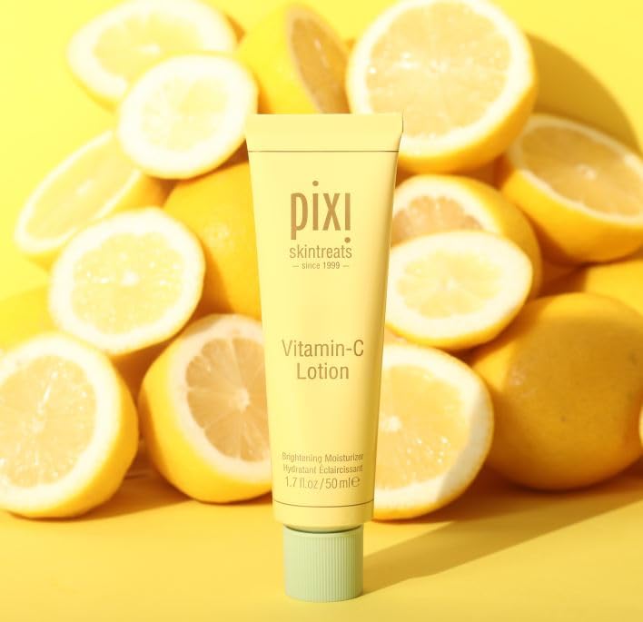 Pixi Vitamin-C Lotion ingredients closeup emphasizing ferulic acid and probiotics.