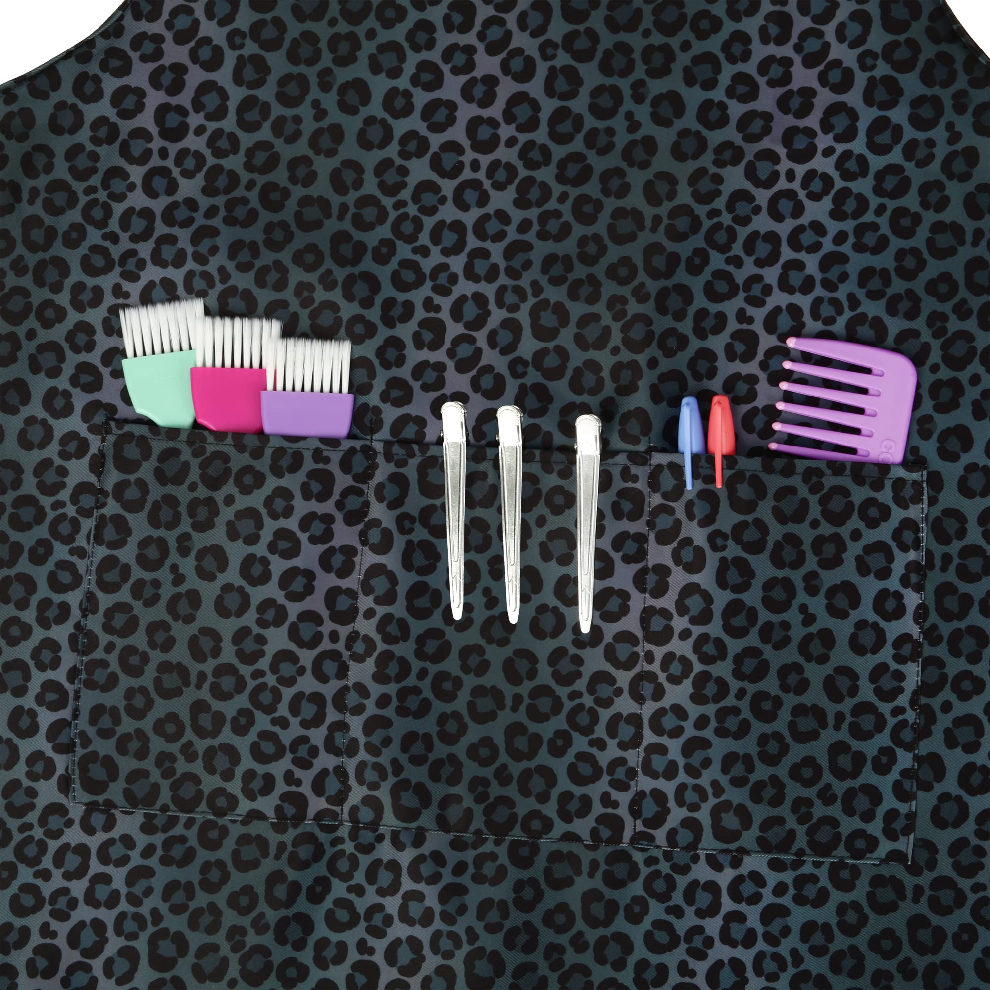 Plum Hill black leopard apron suited for hairdressers during color services.