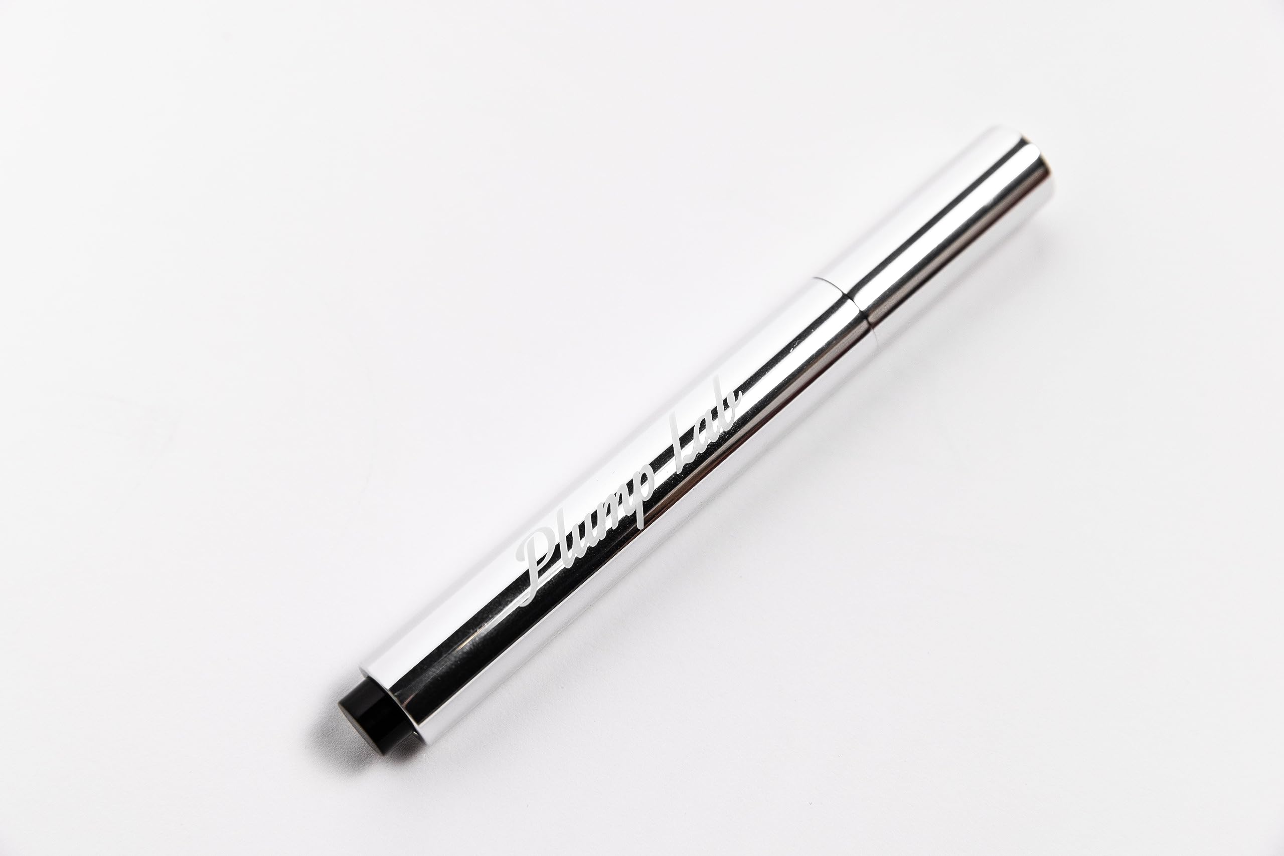 Plump Lab lip plumper close-up showing smooth lip texture.