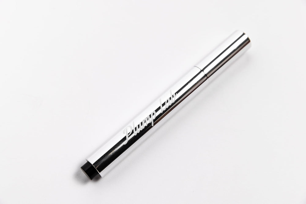 Plump Lab lip plumper close-up showing smooth lip texture.