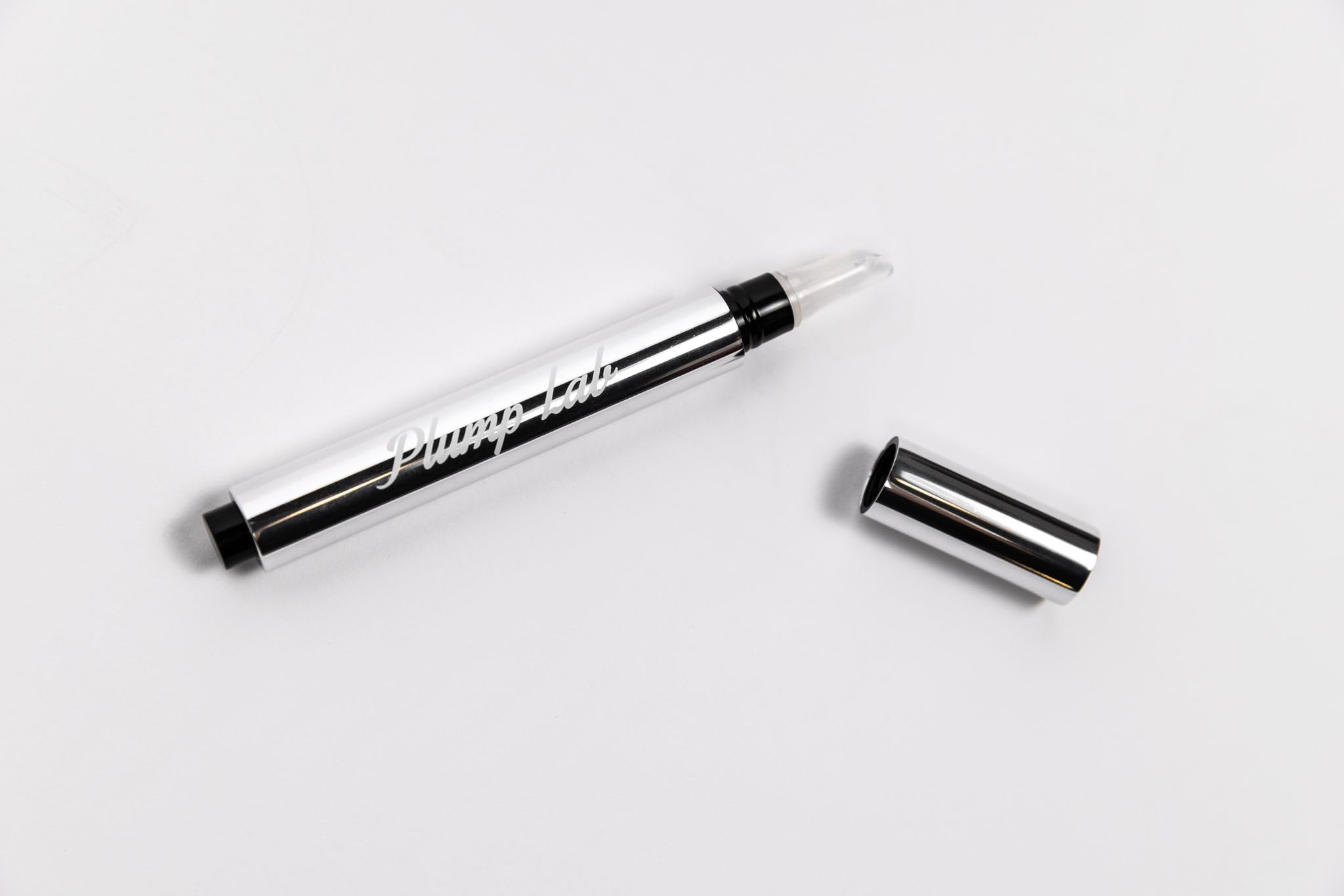 Plump Lab hydration boost for lips during daily routine.