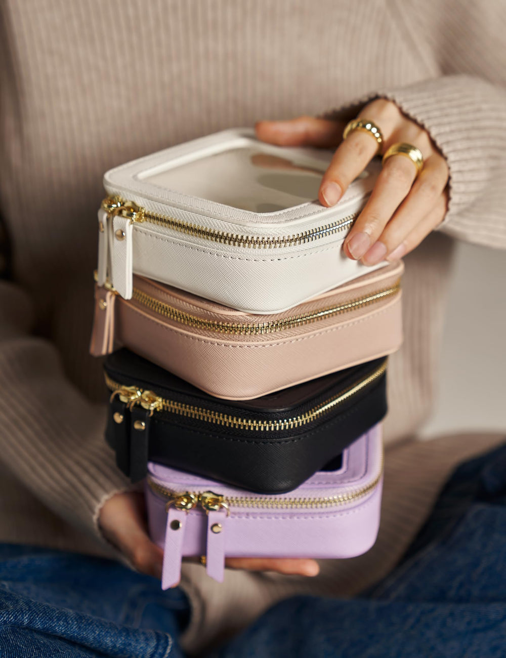 Popvibe compact makeup bag fits lip balms and accessories for quick touchups.